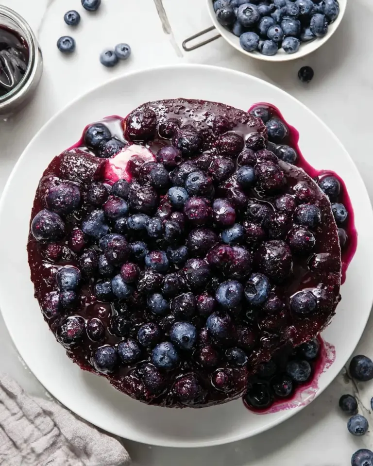 Baked cream cheese blueberry bombs on a plate, fresh and tempting.