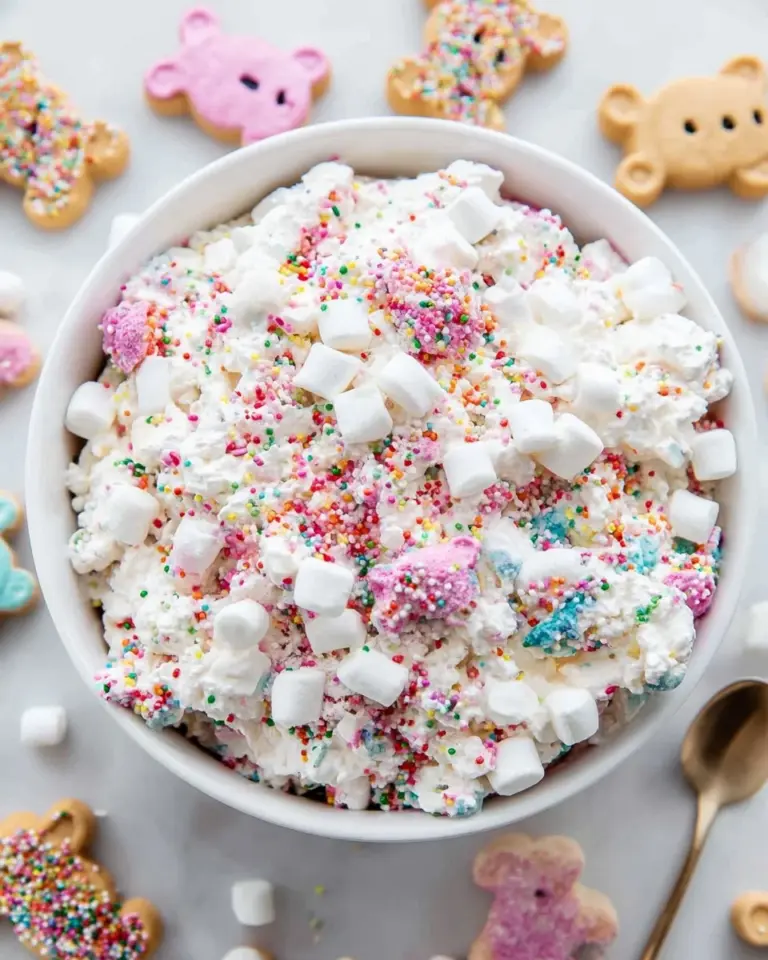Delicious Circus Cookie Salad with colorful frosting and cookie pieces