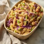 High protein Asian pasta salad with vegetables and flavor-packed dressing.