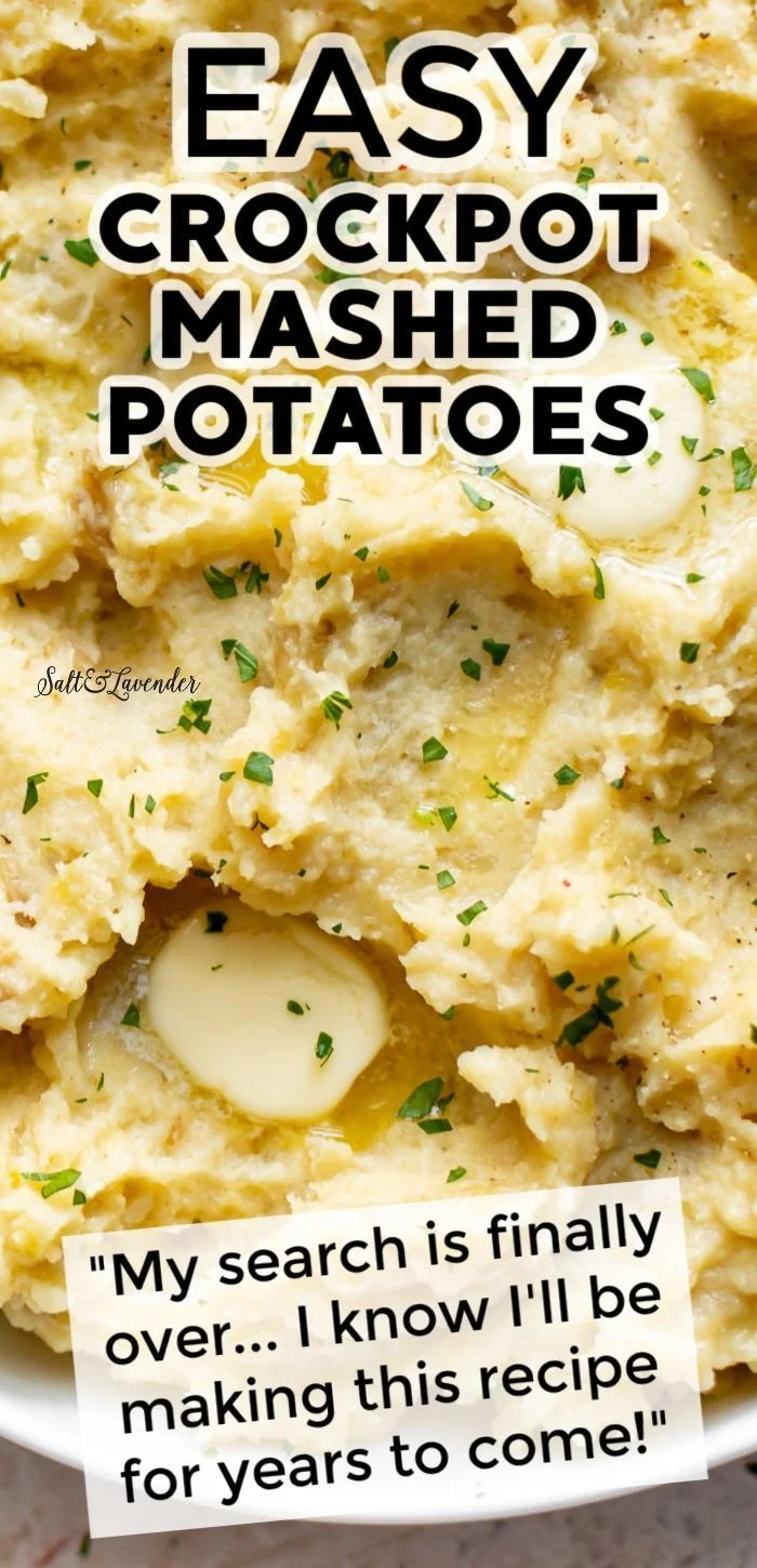 Creamy crockpot mashed potatoes in a bowl, garnished with herbs.